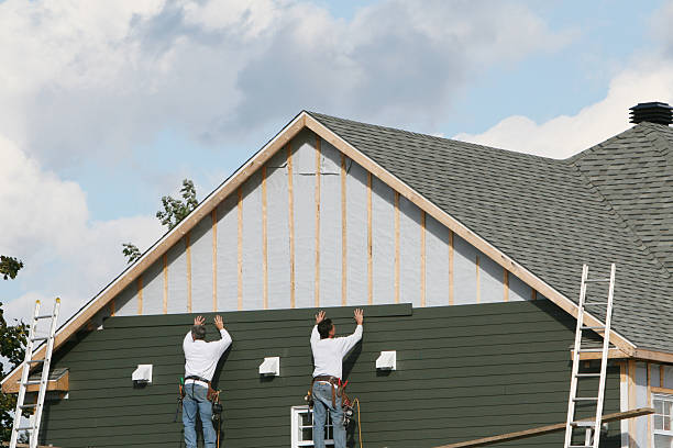 Professional Siding Replacement technician working in Reading, OH